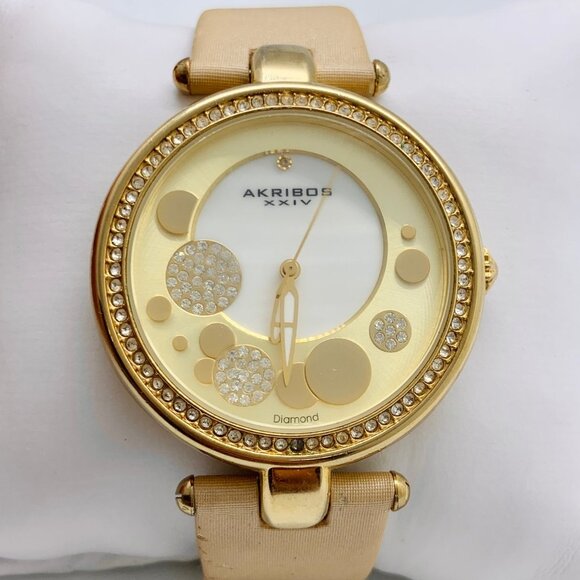 Akribos genuine Diamond sapphire crystal watch 40mm gold tone case women runs - Picture 1 of 7